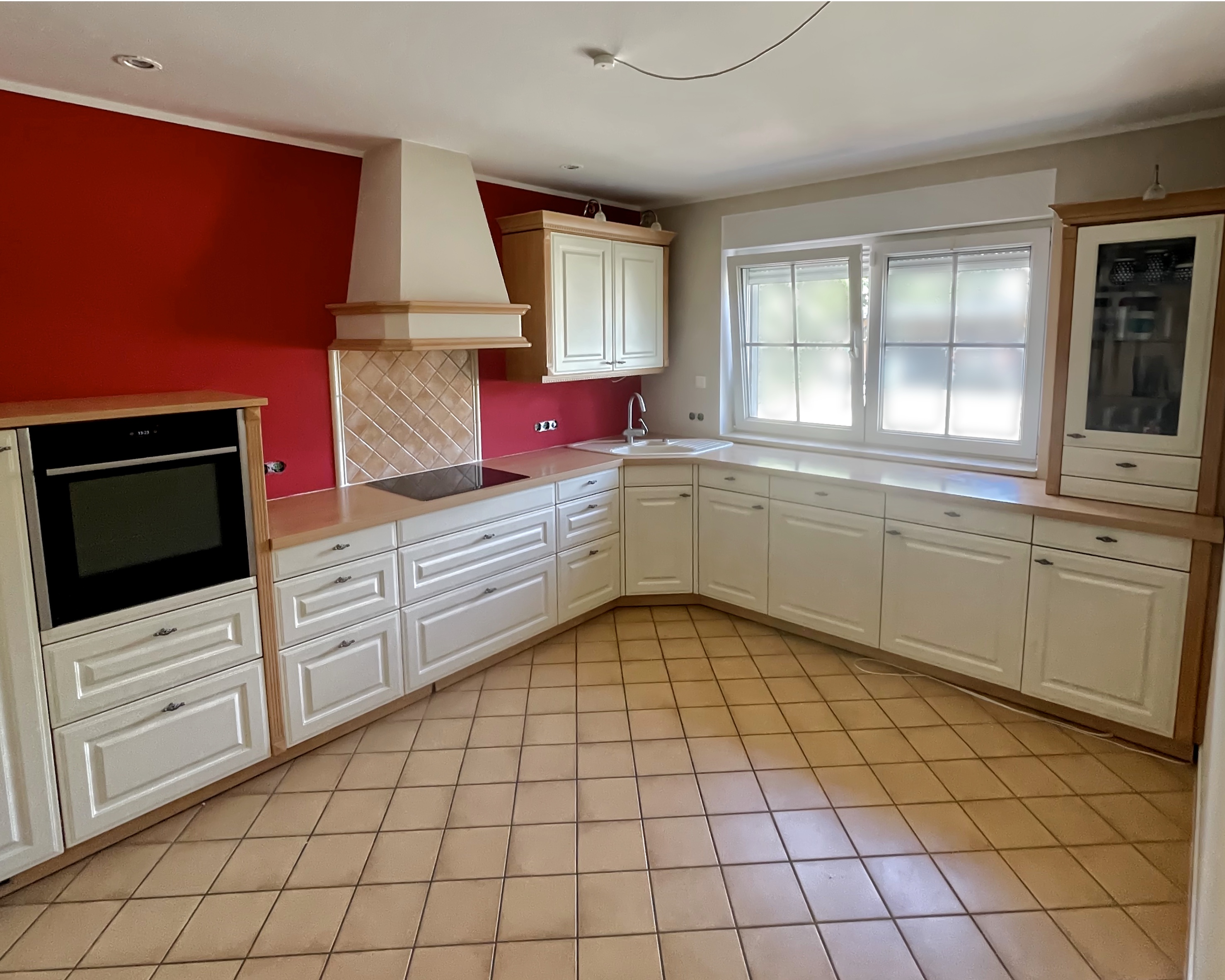 man with quiff and brown tinted sunglasses wearing a fur collar